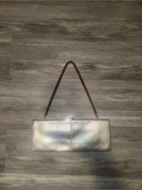 Vintage Y2K Silver baguette clutch by Valerie Stevens